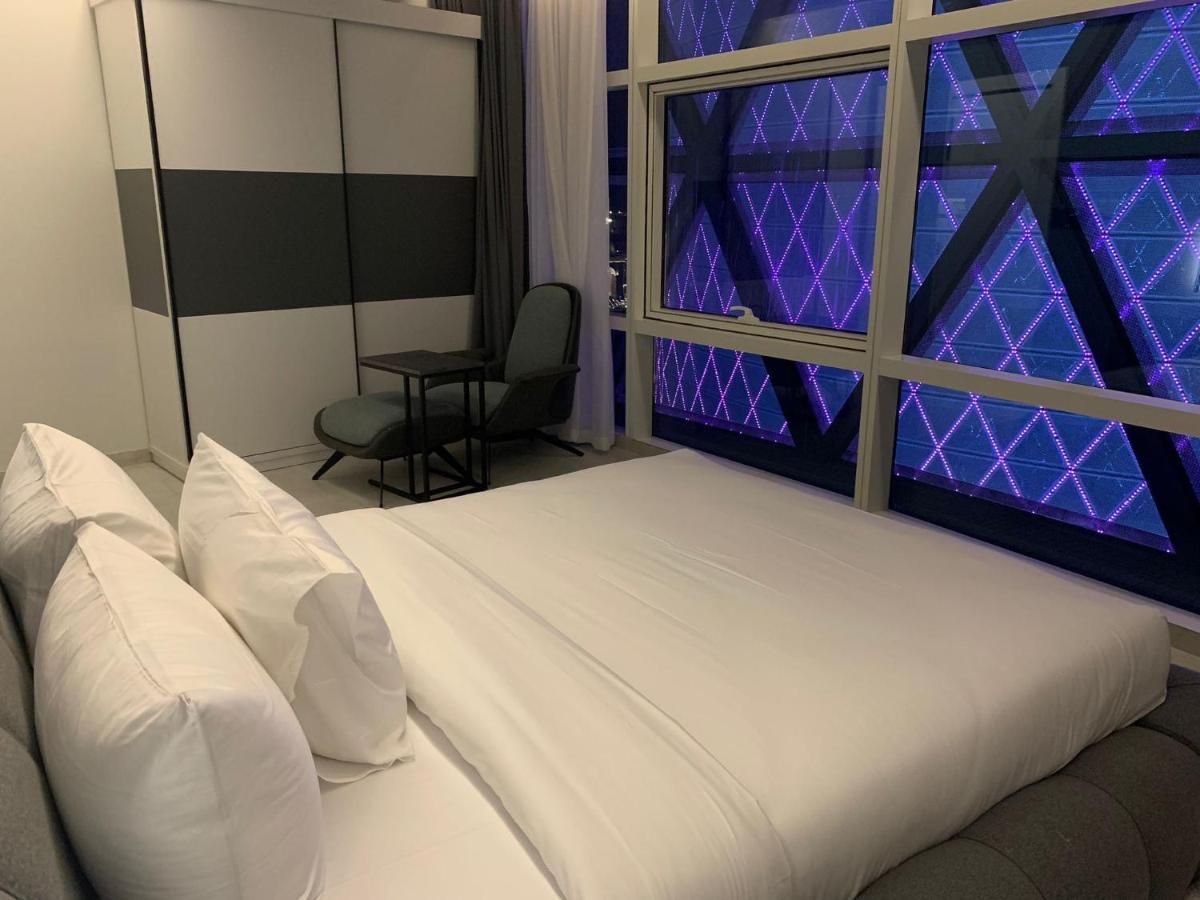 Century Marina Hotel - Lusail Exterior foto A bedroom at the hotel