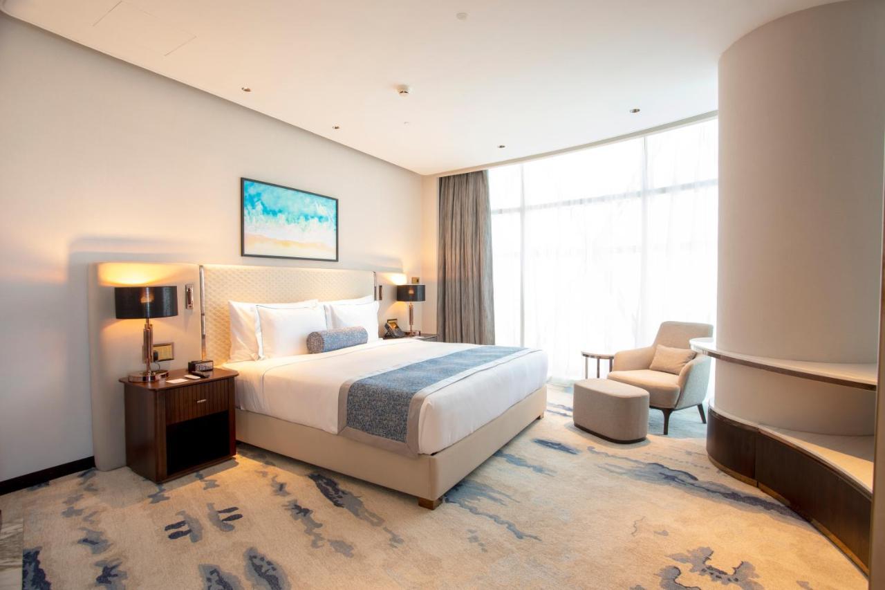 Century Marina Hotel - Lusail Exterior foto A bedroom at the hotel